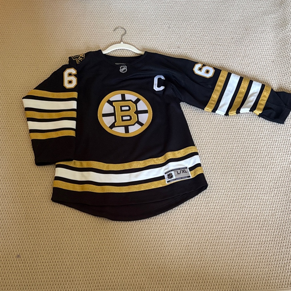 NHL Black and Gold Striped Jersey